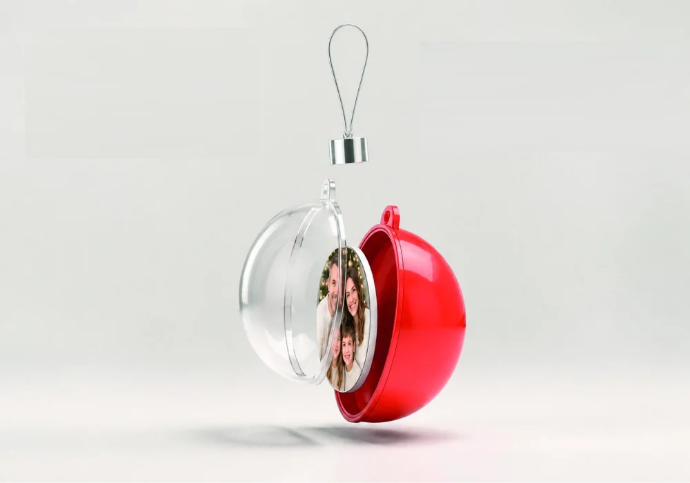 Personalised Christmas photo bauble opening to show a family photograph inside