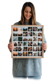 Customer holding a FreeSnaps framed photo collage