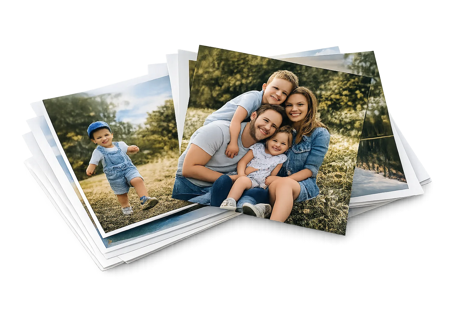 Free photo prints UK: a hand holding a stack of 6x4 prints from FreeSnaps