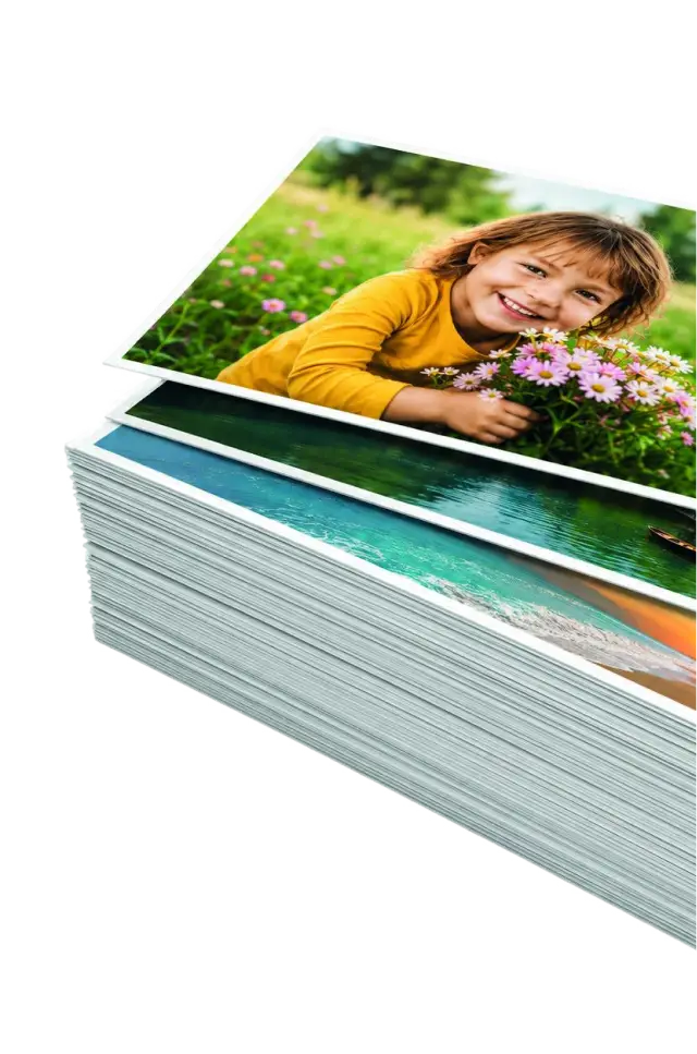 Stack of glossy photo prints from FreeSnaps